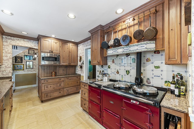 1755 Sunset Ln, Bannockburn, IL 60015 - kitchen with stainless steel microwave, cooktop, wallpapered walls, ornamental molding, and recessed lighting