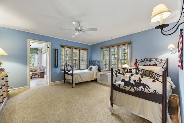 1755 Sunset Ln, Bannockburn, IL 60015 - bedroom with carpet flooring, a ceiling fan, and ornamental molding