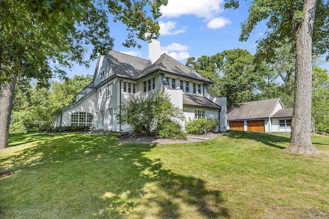 1755 Sunset Ln, Bannockburn, IL 60015 - view of side of home featuring a chimney, a lawn, and stucco siding