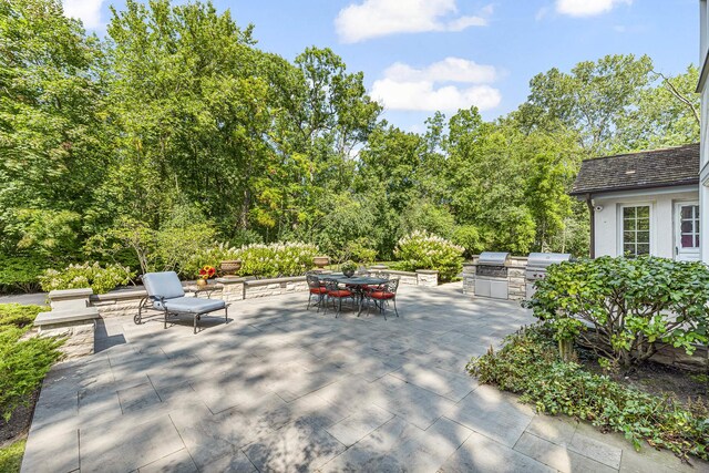 1755 Sunset Ln, Bannockburn, IL 60015 - view of patio / terrace featuring area for grilling and outdoor dining area
