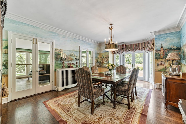 1755 Sunset Ln, Bannockburn, IL 60015 - dining space featuring wallpapered walls, french doors, ornamental molding, hardwood / wood-style flooring, and a chandelier