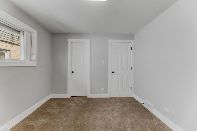422 W 98th Pl, Chicago, IL 60628 - unfurnished bedroom with carpet floors and baseboards