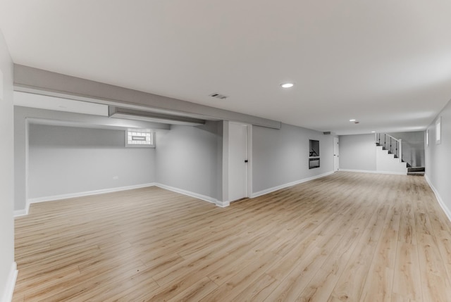 422 W 98th Pl, Chicago, IL 60628 - basement with light wood-style floors, stairway, and recessed lighting
