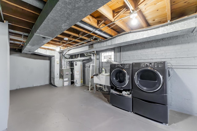 422 W 98th Pl, Chicago, IL 60628 - below grade area with gas water heater, washing machine and clothes dryer, and heating unit