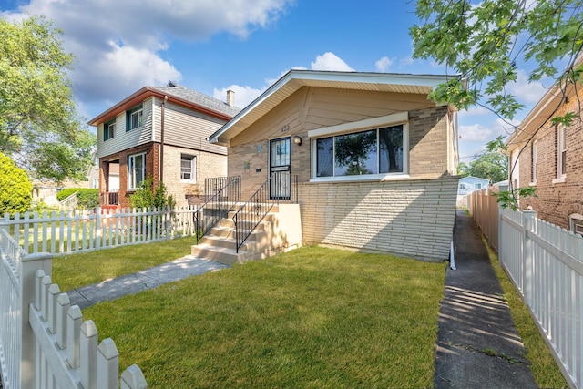 422 W 98th Pl, Chicago, IL 60628 - view of front facade featuring brick siding and a fenced backyard