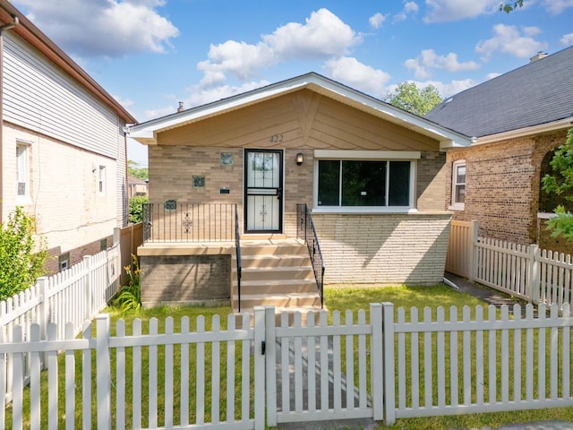 422 W 98th Pl, Chicago, IL 60628 - view of front of house with brick siding and a fenced backyard