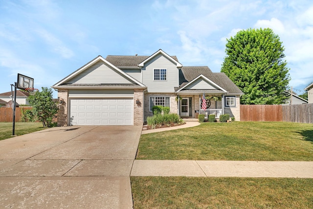 2570 Cobblestone Ct, Morris, IL 60450 - traditional-style house with covered porch, brick siding, a garage, and concrete driveway