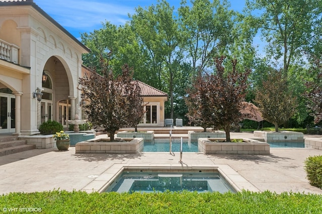 1031 Barrys Ct, Lake Forest, IL 60045 - outdoor pool with french doors, an in-ground hot tub, and a patio area