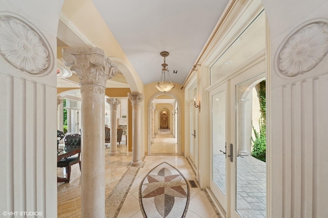 1031 Barrys Ct, Lake Forest, IL 60045 - hallway with inlaid floor details, ornate columns, arched walkways, light tile patterned flooring, and ornamental molding