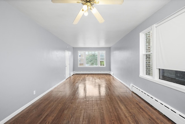 1802 S 50th Ave, Cicero, IL 60804 - spare room with a baseboard radiator, wood finished floors, and ceiling fan