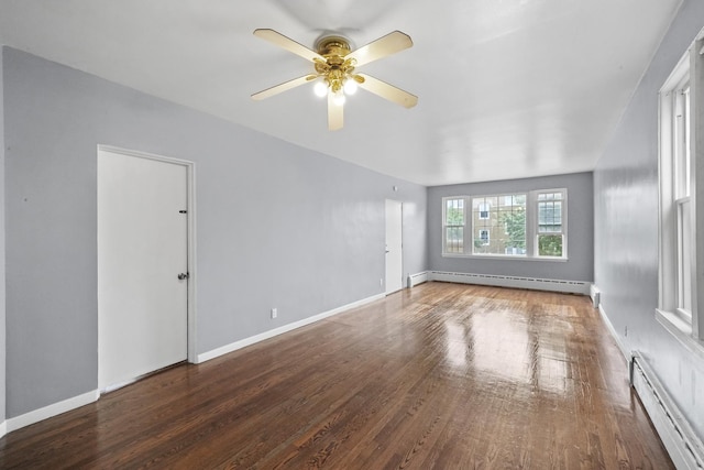 1802 S 50th Ave, Cicero, IL 60804 - empty room with baseboard heating, wood finished floors, and a ceiling fan