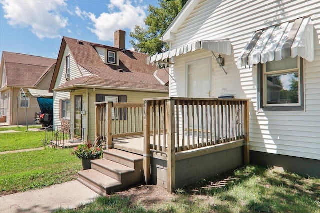 711 W Front St, Bloomington, IL 61701 - wooden deck with a yard