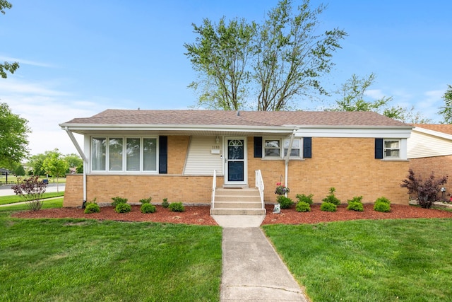 7288 174th Pl, Tinley Park, IL 60477 - ranch-style home featuring brick siding and a front yard