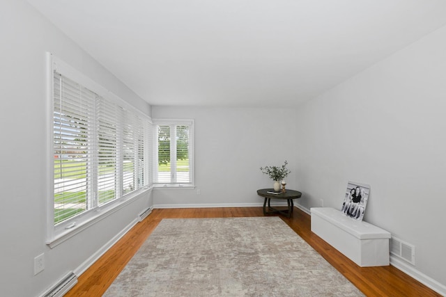 7288 174th Pl, Tinley Park, IL 60477 - sitting room with wood finished floors and baseboards