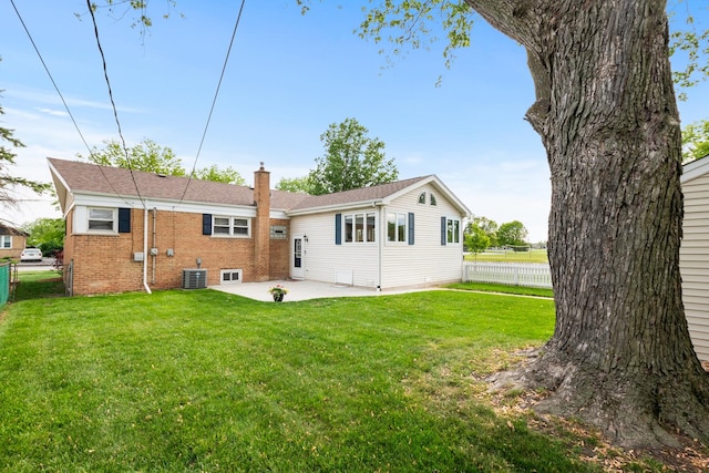 7288 174th Pl, Tinley Park, IL 60477 - back of house with a chimney, a patio, and brick siding