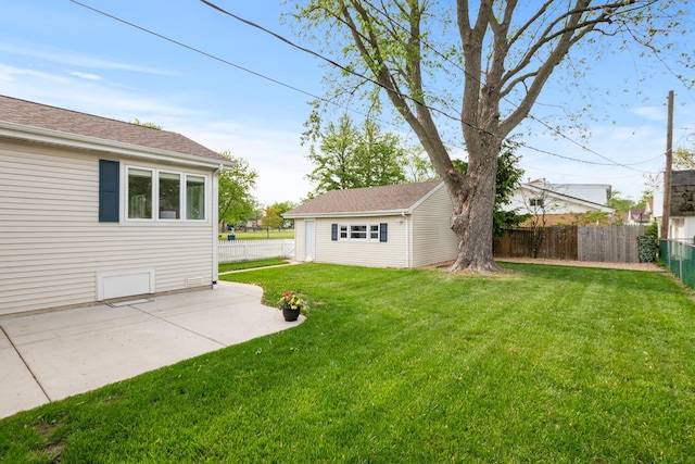 7288 174th Pl, Tinley Park, IL 60477 - fenced backyard featuring an outdoor structure and a patio area
