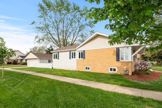 7288 174th Pl, Tinley Park, IL 60477 - view of side of home with a lawn, a garage, and brick siding