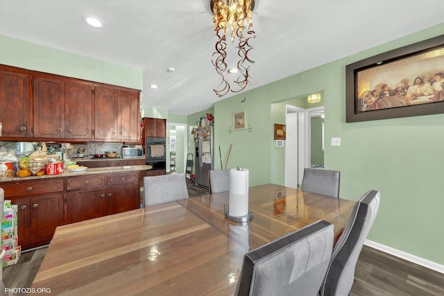 2606 Ridge Rd, Lansing, IL 60438 - dining room featuring dark wood-style floors, recessed lighting, and a chandelier