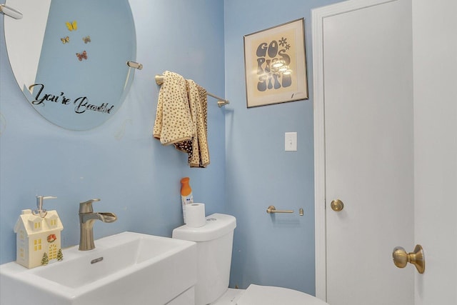 2606 Ridge Rd, Lansing, IL 60438 - half bath with a sink and toilet