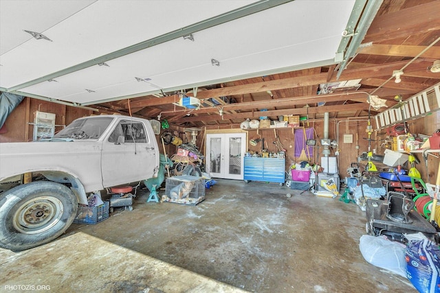 2606 Ridge Rd, Lansing, IL 60438 - garage with french doors and a garage door opener