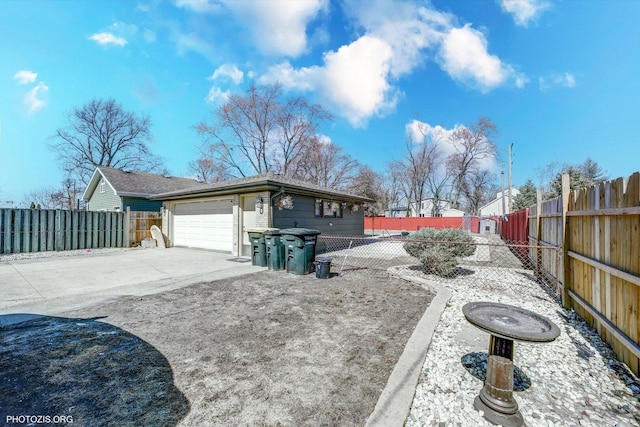 2606 Ridge Rd, Lansing, IL 60438 - fenced backyard featuring concrete driveway and an attached garage