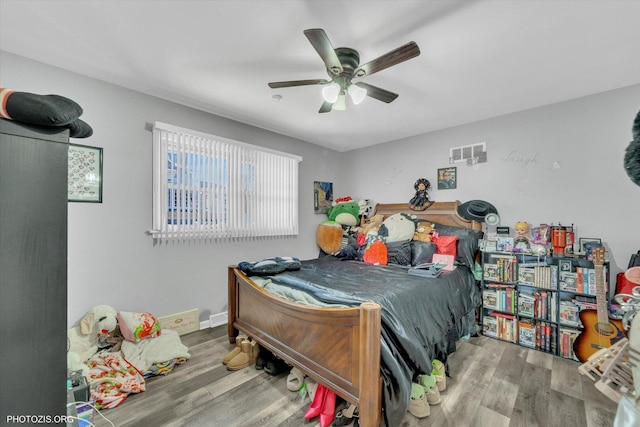 2606 Ridge Rd, Lansing, IL 60438 - bedroom with wood finished floors and a ceiling fan