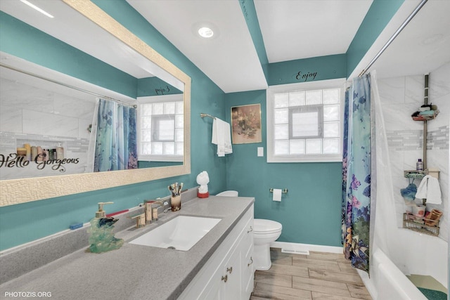 2606 Ridge Rd, Lansing, IL 60438 - full bath featuring vanity, wood tiled floors, and shower / bathtub combination with curtain