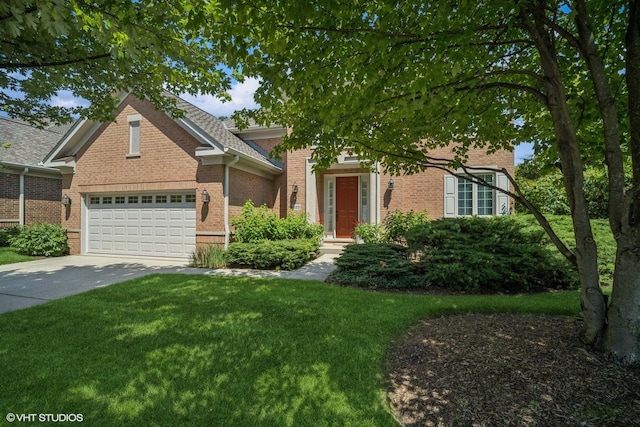 823 Balmoral Ln, Northbrook, IL 60062 - view of front of home with brick siding, an attached garage, concrete driveway, and a front lawn