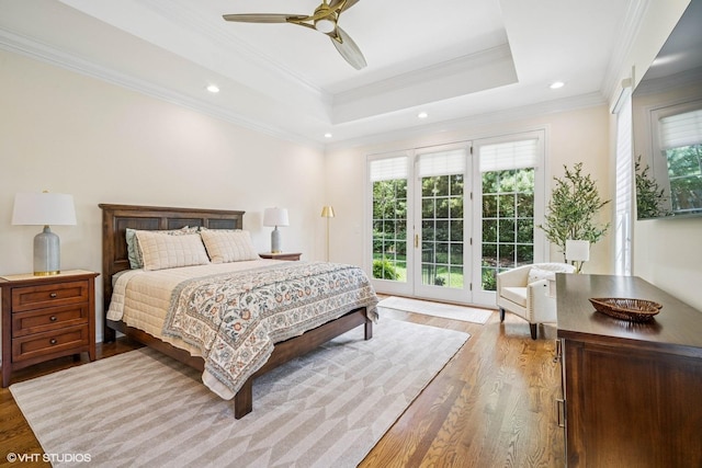 823 Balmoral Ln, Northbrook, IL 60062 - bedroom with access to outside, wood finished floors, recessed lighting, crown molding, and a tray ceiling