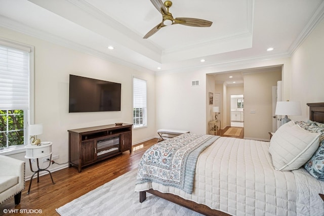 823 Balmoral Ln, Northbrook, IL 60062 - bedroom with wood finished floors, recessed lighting, a tray ceiling, crown molding, and a ceiling fan