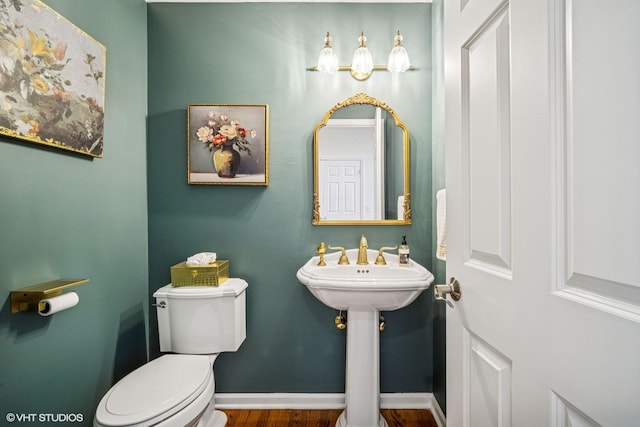 823 Balmoral Ln, Northbrook, IL 60062 - half bathroom with toilet and wood finished floors