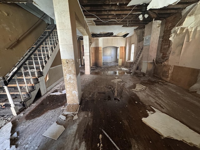 645 E 113th St, Chicago, IL 60628 - miscellaneous room featuring stairway and arched walkways