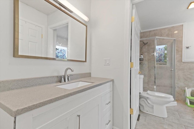 10067 W Logan Ct, Zion, IL 60099 - bathroom featuring vanity, a shower stall, and tile patterned floors