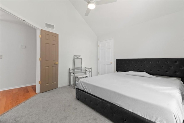 10067 W Logan Ct, Zion, IL 60099 - carpeted bedroom with lofted ceiling and ceiling fan