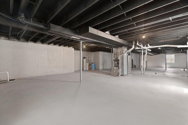 10067 W Logan Ct, Zion, IL 60099 - basement with heating unit and water heater