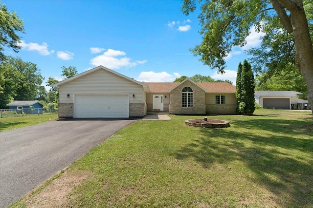 10067 W Logan Ct, Zion, IL 60099 - single story home featuring driveway, an attached garage, and brick siding