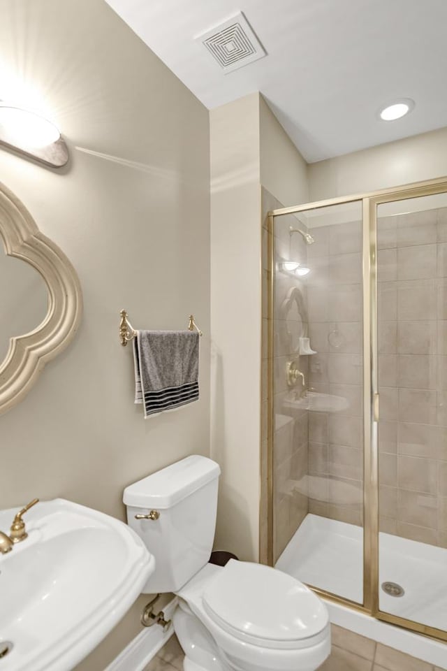 1123 Chadwick Ct, Aurora, IL 60502 - bathroom with a shower stall and tile patterned flooring