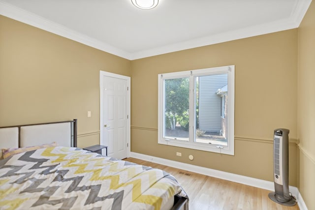 1123 Chadwick Ct, Aurora, IL 60502 - bedroom featuring crown molding and wood finished floors