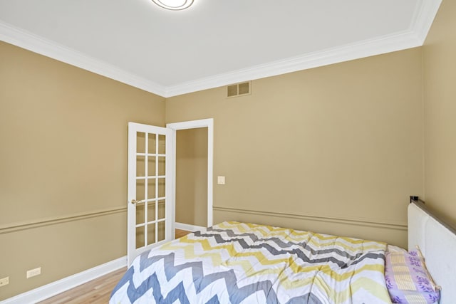 1123 Chadwick Ct, Aurora, IL 60502 - bedroom featuring crown molding and wood finished floors