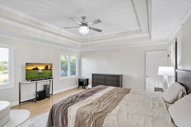 1123 Chadwick Ct, Aurora, IL 60502 - bedroom with a tray ceiling, wood finished floors, ornamental molding, and a ceiling fan