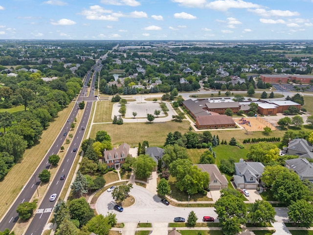 1123 Chadwick Ct, Aurora, IL 60502 - aerial view of residential area with a main thoroughfare and a tree filled landscape