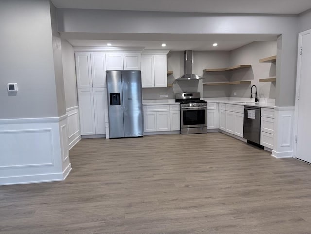 4819 W 109th St Unit 204, Oak Lawn, IL 60453 - kitchen featuring appliances with stainless steel finishes, wall chimney range hood, open shelves, light wood-style floors, and a wainscoted wall