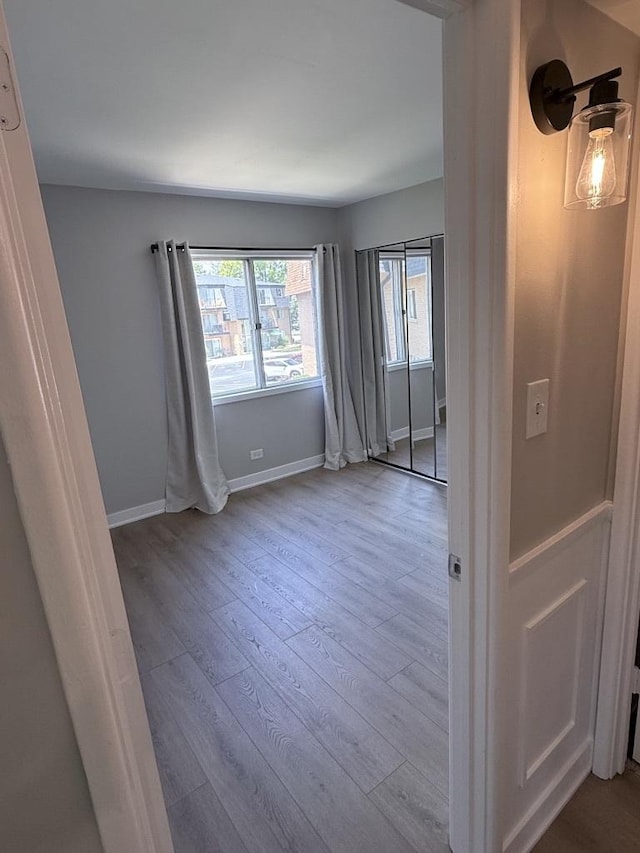 4819 W 109th St Unit 204, Oak Lawn, IL 60453 - unfurnished room featuring hardwood / wood-style flooring and baseboards