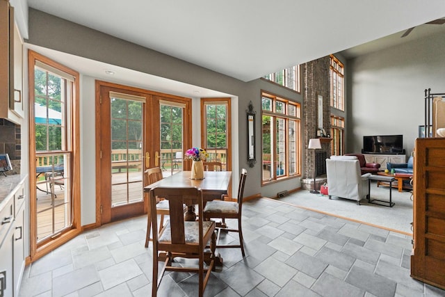 3063 Wedgewood Dr, Dekalb, IL 60115 - dining area featuring french doors and light stone finish flooring