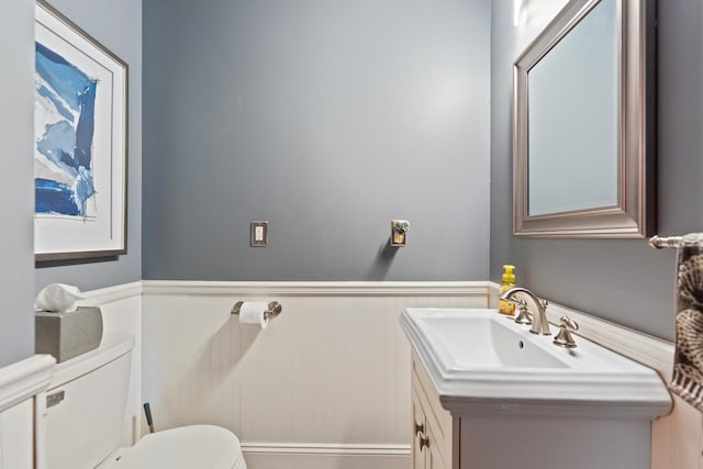 3063 Wedgewood Dr, Dekalb, IL 60115 - half bathroom featuring wainscoting and vanity