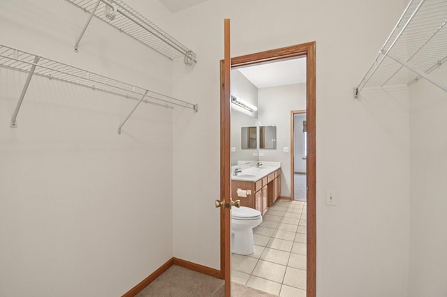 11636 Waterway Ct, Orland Park, IL 60467 - walk in closet featuring light colored carpet and light tile patterned floors