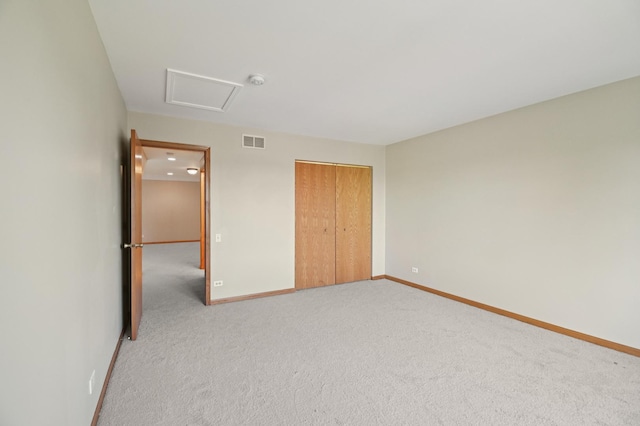 11636 Waterway Ct, Orland Park, IL 60467 - unfurnished bedroom with light colored carpet, a closet, and attic access
