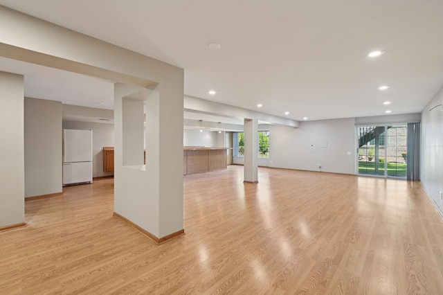 11636 Waterway Ct, Orland Park, IL 60467 - unfurnished living room with plenty of natural light, recessed lighting, and light wood-style floors