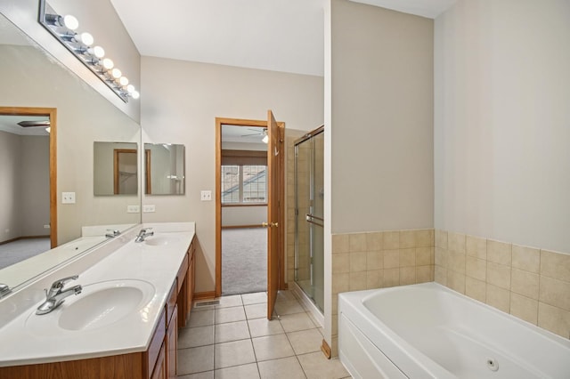 11636 Waterway Ct, Orland Park, IL 60467 - full bathroom with tile patterned flooring, double vanity, a garden tub, and a stall shower