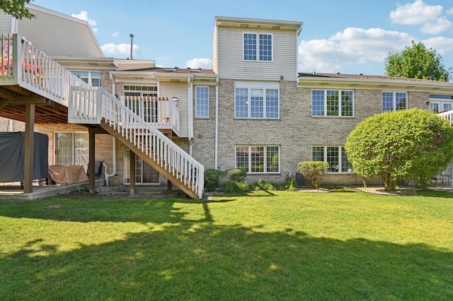 11636 Waterway Ct, Orland Park, IL 60467 - rear view of house with stairs, a wooden deck, brick siding, and a yard